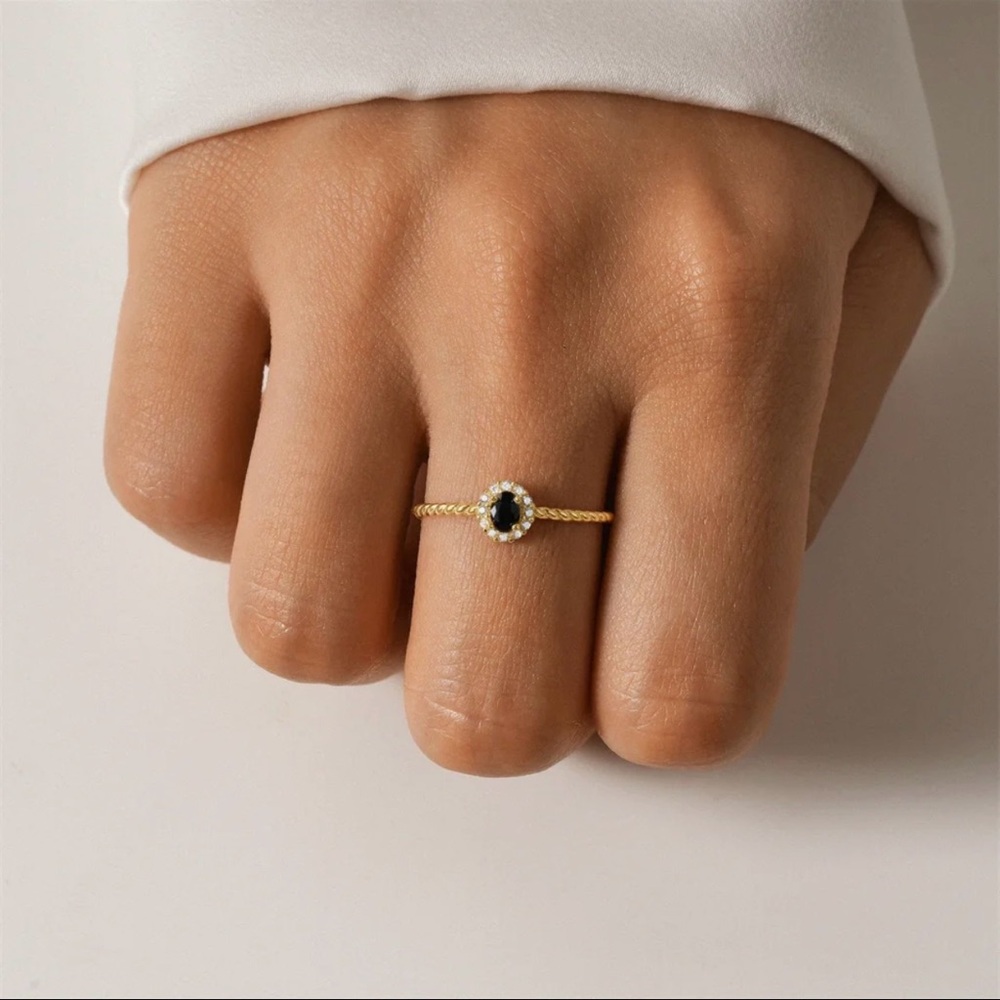 Adjustable Ring with a Yellow Gold Filled Band and has Synthetic Black Diamond